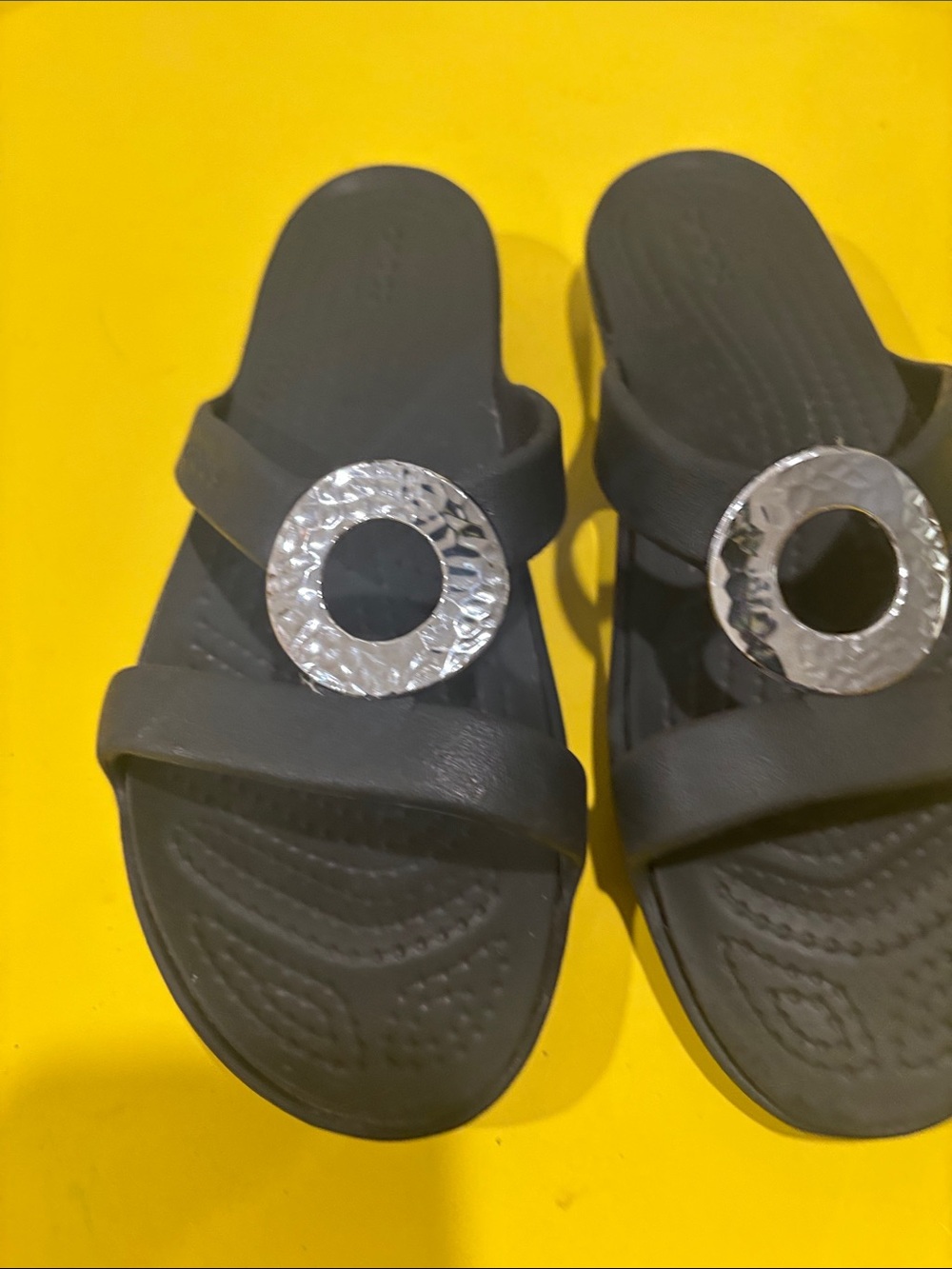 Crocs Women's Black Slide Sandals with Silver Accent.  10W